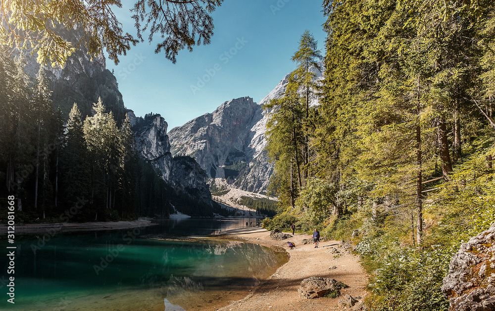 Incredible Nature landscape. Famous alpine place of the world Amazing Braies Lake with Seekofel mount on background. Awesome nature Scenery. Popular plase for photographers. Beautiful in the World Incredible Nature landscape. Famous alpine place of the world Amazing Braies Lake with Seekofel mount on background. Awesome nature Scenery. Popular plase for photographers. Beautiful in the World