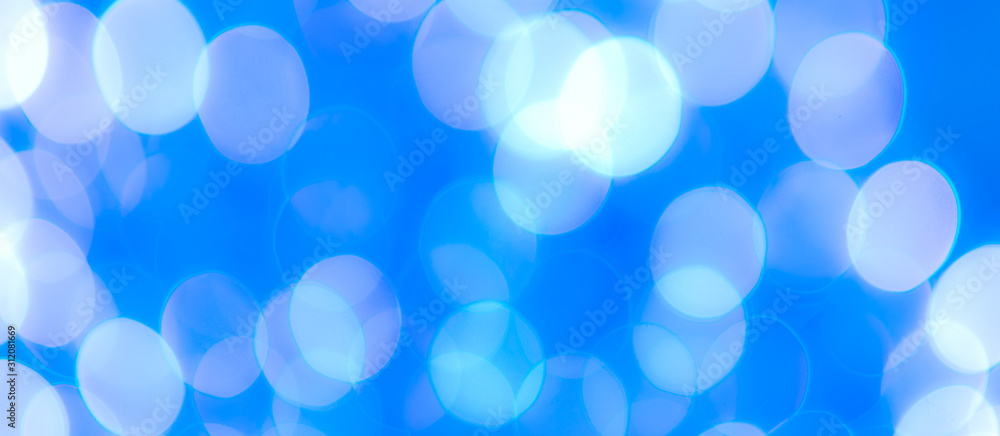 Abstract Bokeh Blue and green background of defocused glittering lights. Christmas, Party, New Year, luxurious background pattern concept. banner. Abstract Bokeh Blue and green background of defocused glittering lights. Christmas, Party, New Year, luxurious background pattern concept. banner.