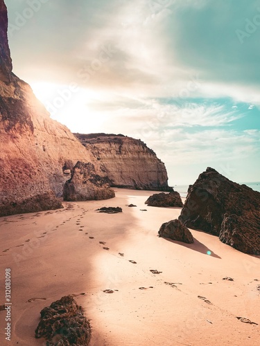 One of the must visit spot at the famous coastline with rocks and beautiful beaches at sunset light Praia da Marinha, Famous Beach, Algarve Coast, Lagoa, Portimao in South Portugal, Atlantic Ocean photo