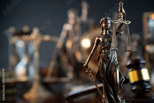 Law symbol composition and background. Judge's gavel, Themis statue and scale.