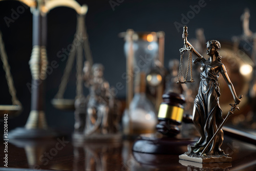 Law symbol composition and background. Judge's gavel, Themis statue and scale.