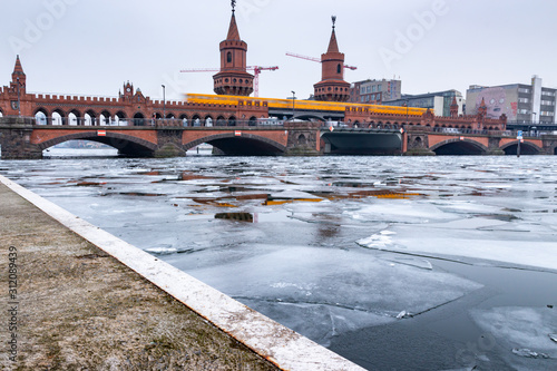Ice Shells on the Spree at Oberbaum bridge in Berlin