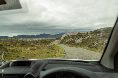 drivers view of road through mountains