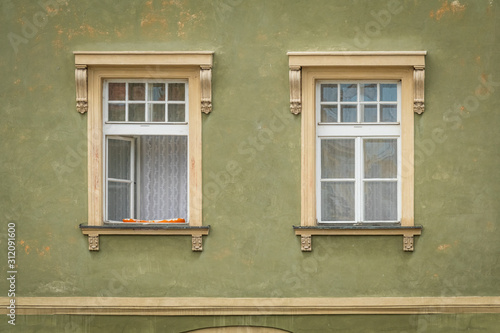 Obraz na płótnie Green facade of the old house. The Windows and decoration of walls in Litomerice, Czechia w salonie