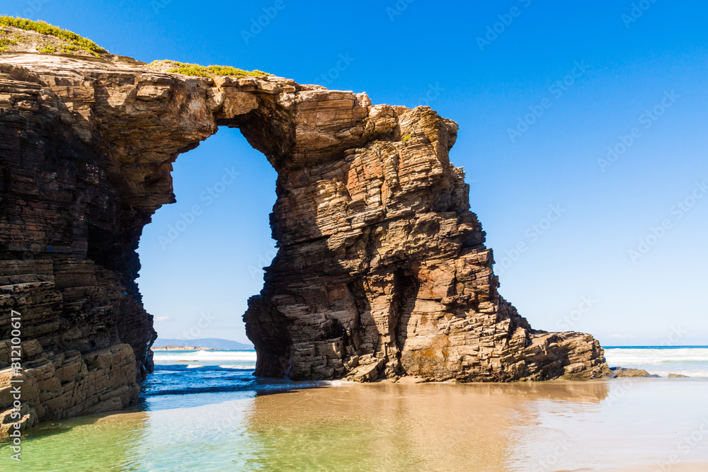 Wonderful stone figures. Eroded beach coastline. Cathedrals beach at the Atlantic Ocean, Cantabric coast Lugo, Galicia, Spain - Playa de las Catedrales.