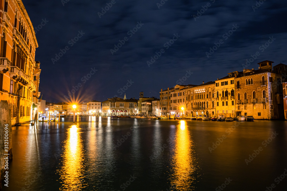night view onto grand canal in venice italy