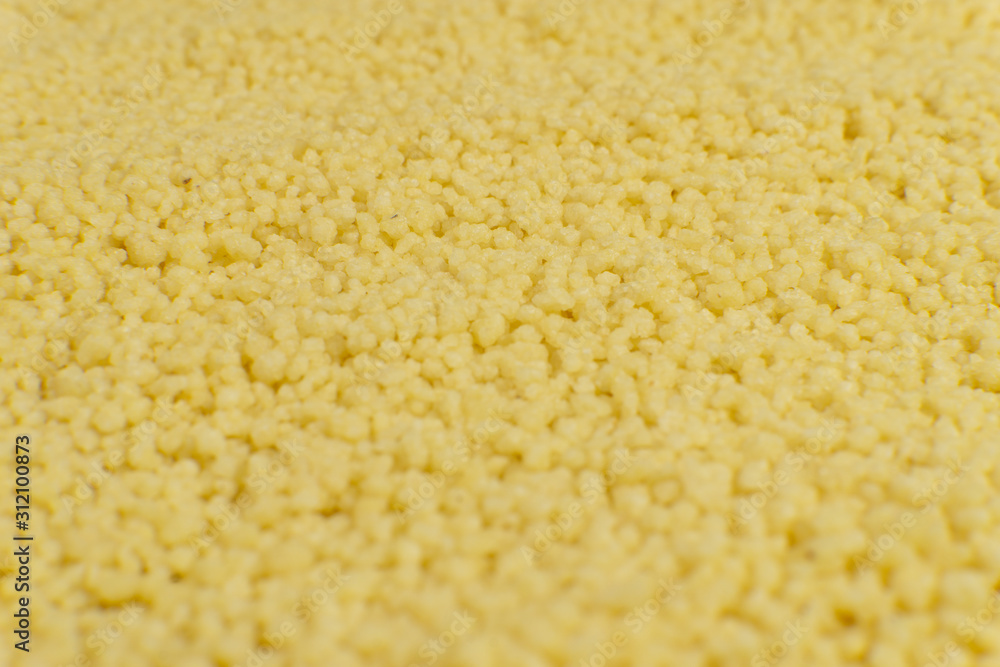 Couscous filling frame making a food texture or background. Couscous filling frame making a food texture or background.