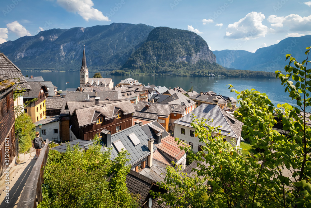 View of Hallstatt village from lake Hallstater See in Alps. Austria. Popular tourist destination.