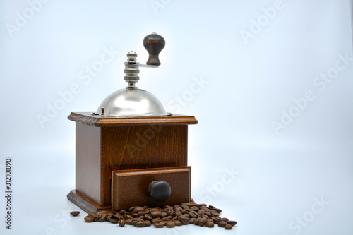 old coffee grinder isolated on white background