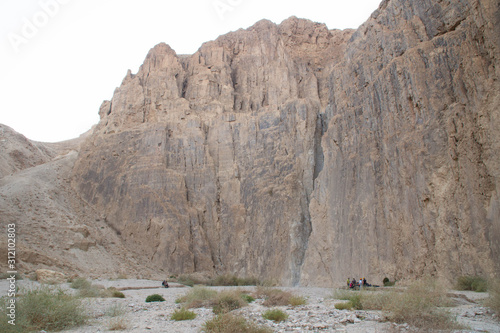 People resting in the mountains of Judaean Desert. Dead Sea area, Israel.