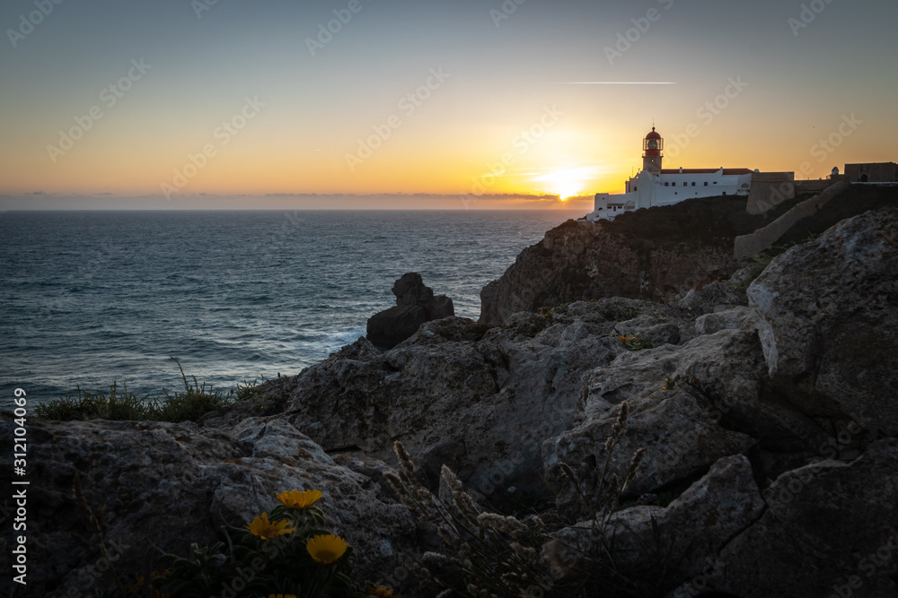 lighthouse at sunset, sagres. Lighthouse of Cabo de São Vicente