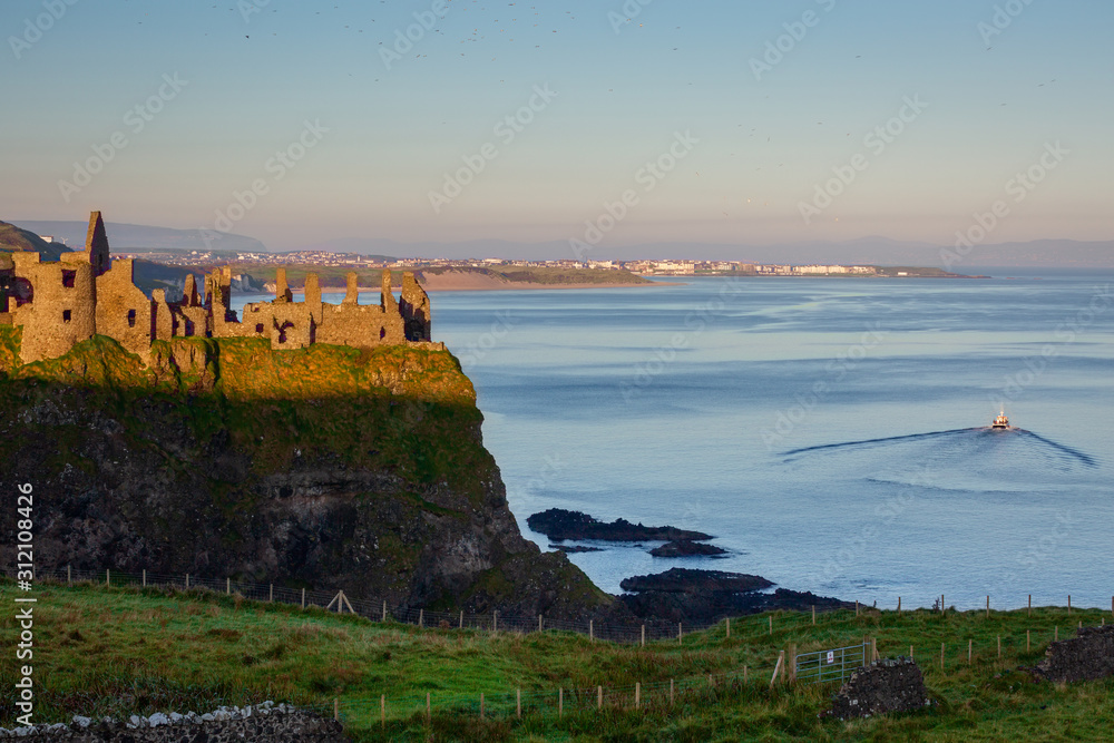 Early Morning Fishing Trip Heads Back to Portrush from Dunluce Castle Northern Ireland