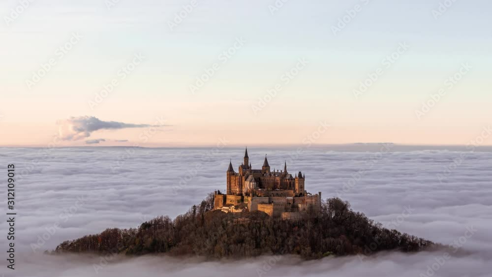 Hohenzollern castle foggy above clouds sunset timelapse Hohenzollern castle foggy above clouds sunset timelapse