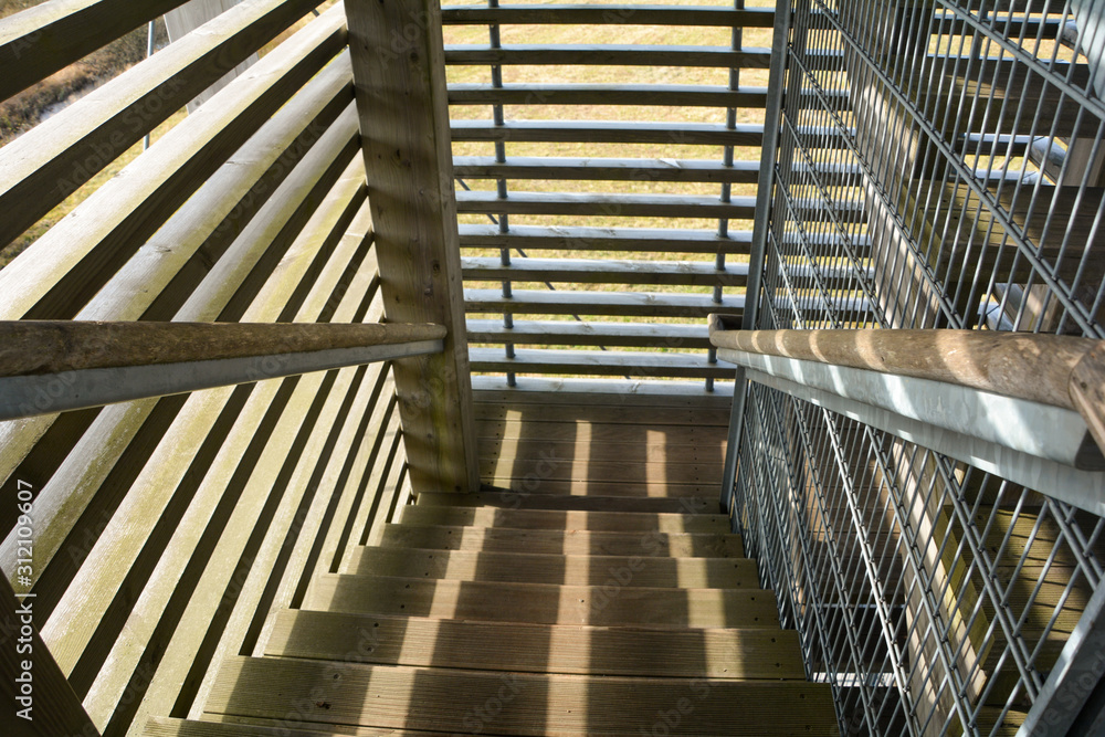 Obraz premium Down stairs in a wooden lookout towe