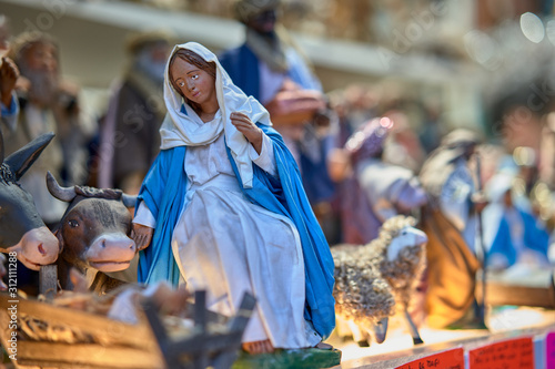 Slika na platnu Set of traditional Nativity Scene figures at the Christmas market in Europe