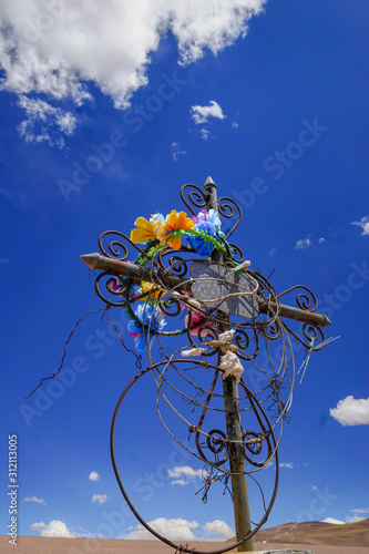Close-up of a cross in the cemetery outside Mina La Casualidad in the puna desert near Salta, Argentina