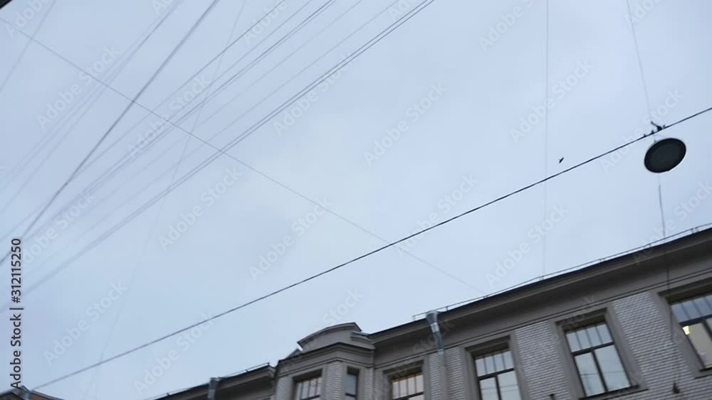 the wires at the top are beautifully intertwined in the city the wires at the top are beautifully intertwined in the city