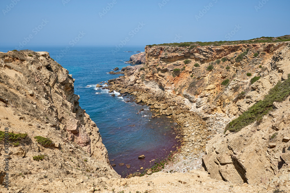 Portugal. Lagos. West coast of the Atlantic. Cape at the mouth of the Carrapateira River. Rocky lagoon