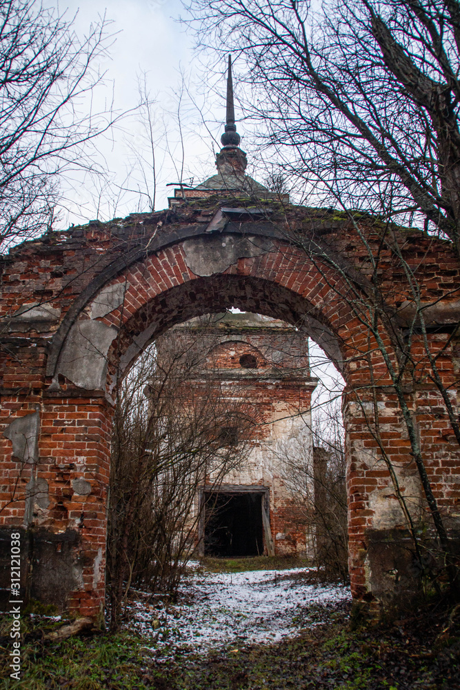 Entrance to the abandoned Church of the Kazan Icon in winter, Rusilovo, Russia