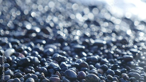  black beach pebble waves sea