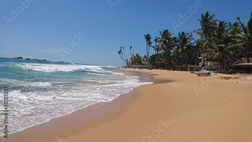 tropical beach ocean waves in Sri Lanka
