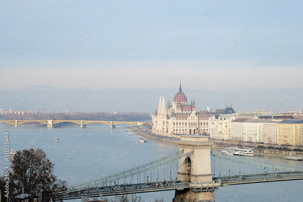 Budapest city panorama with Hungarian Parliament building on Danube River and Chain Bridge.