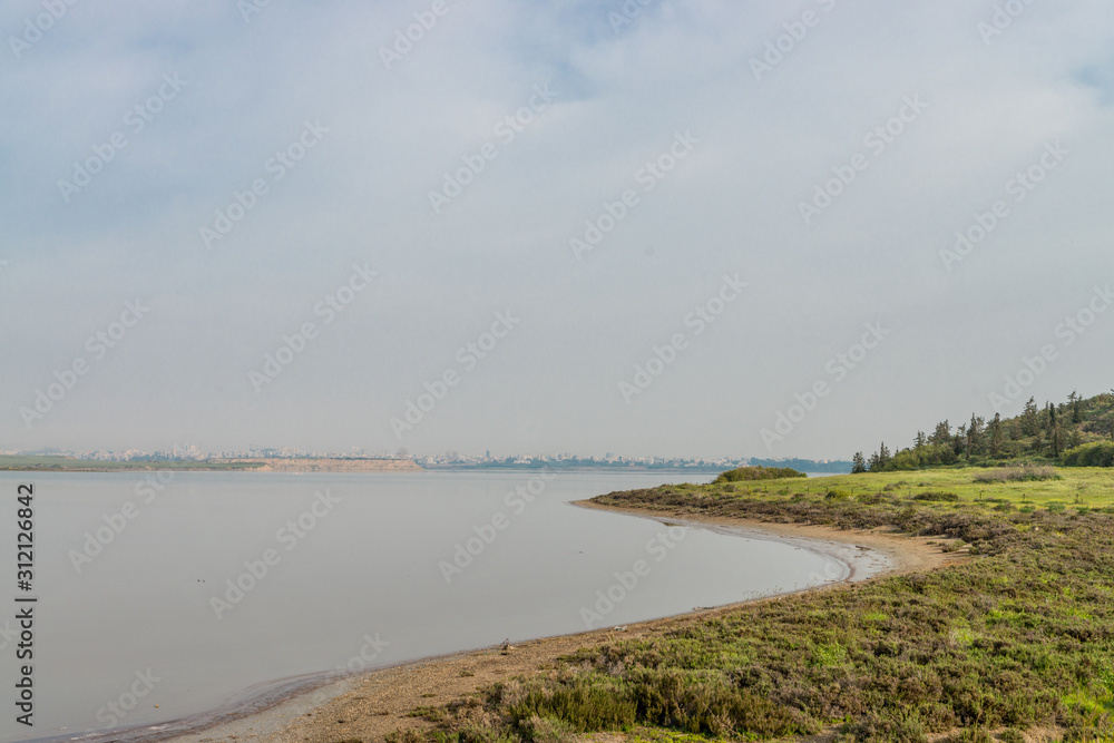 Shore of Larnaca Salt lake with buildings