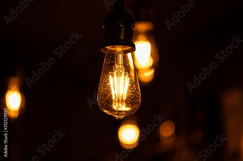 Close up glowing light bulb