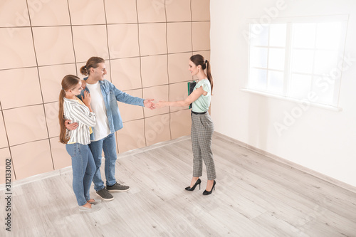 Man shaking hands with real...