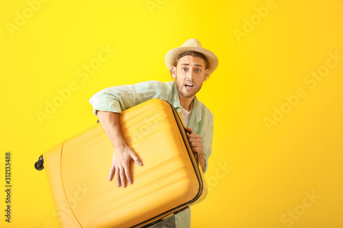 Hurrying male tourist with ...