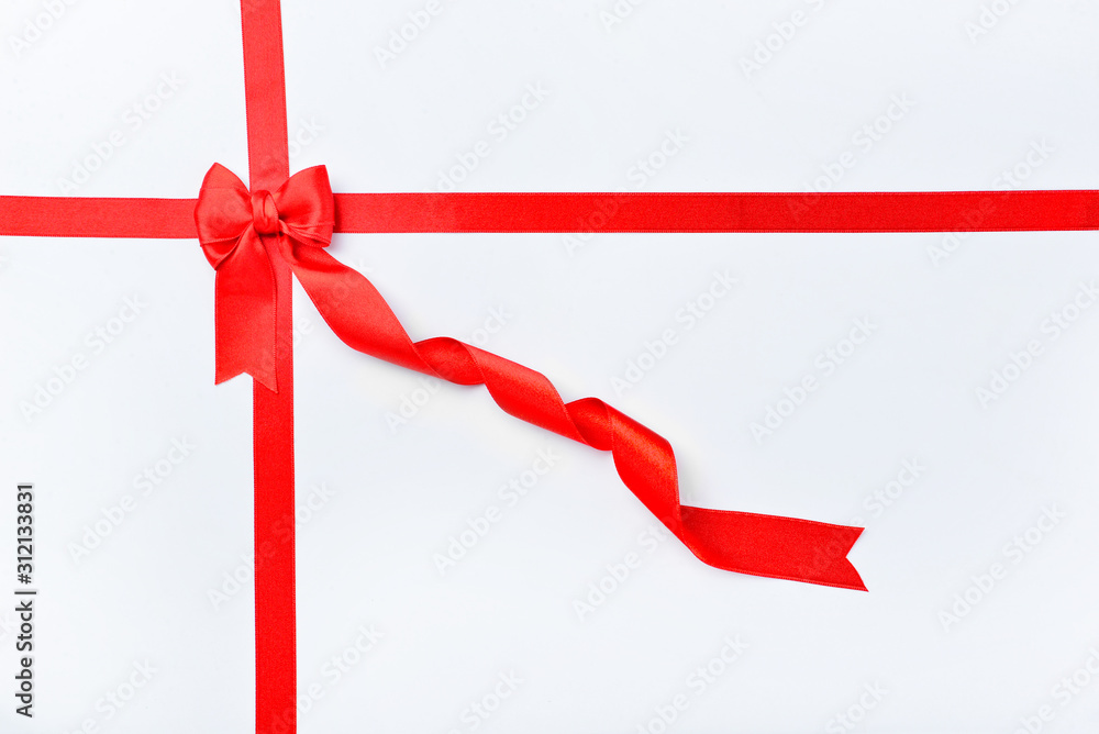 Beautiful red ribbons and bow on white background Beautiful red ribbons and bow on white background