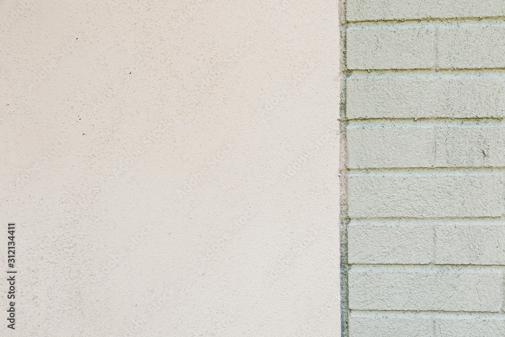Fototapeta premium White concrete wall with green brick background texture