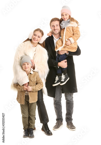 Happy family in winter clot...