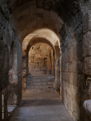Stone arch in the Roman theatre of Amman  Jordan  ancient historic monumental building in the Middle East