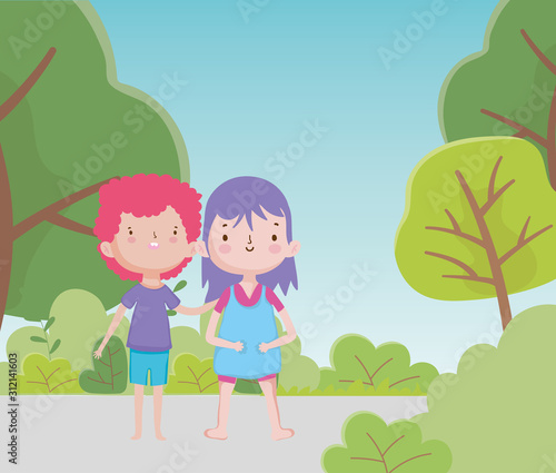 happy childrens day cute little boy and girl in the road park trees