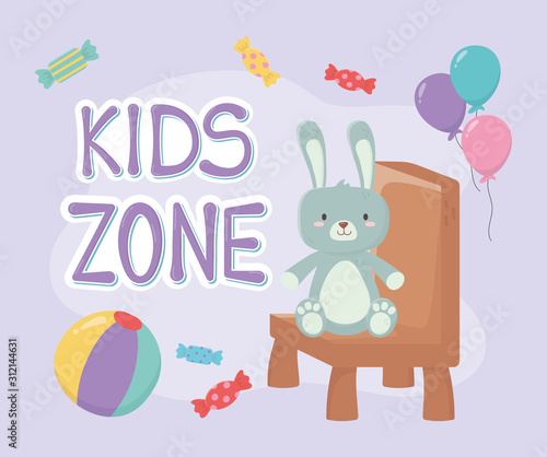 kids zone  cute rabbit sitting on chair