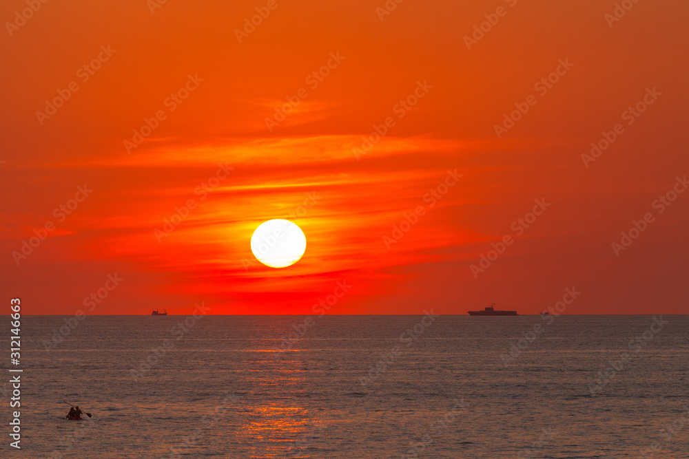 red sunset above the sea at Kata beach Phuket Thailand