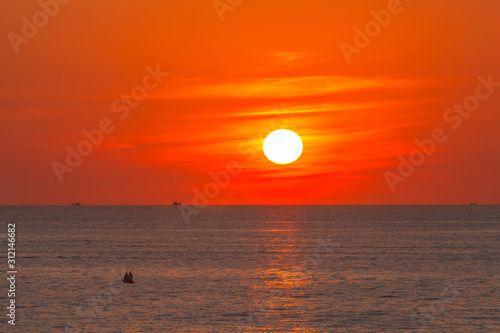 red sunset above the sea at Kata beach Phuket Thailand