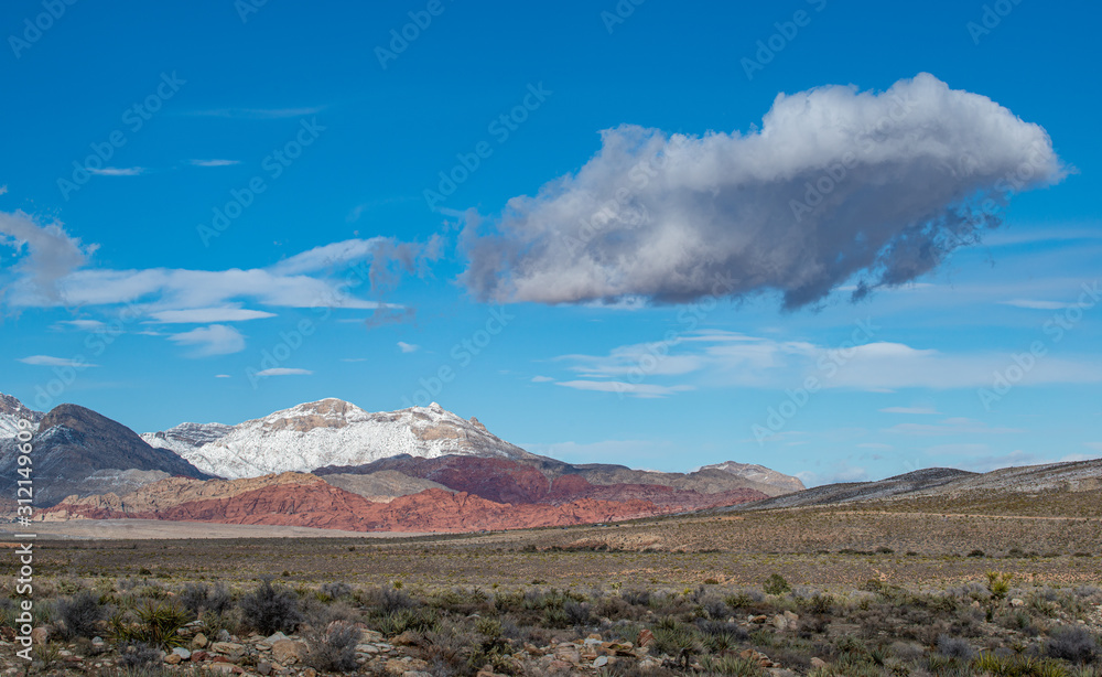 USA, Nevada, Clark County, Red Rock Canyon National Conservation Area. Snow covers the mountains above the famous red rocks outside Las Vegas.