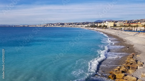 Fototapeta Naklejka Na Ścianę i Meble -  Surf breaking on the beach in Nice, France