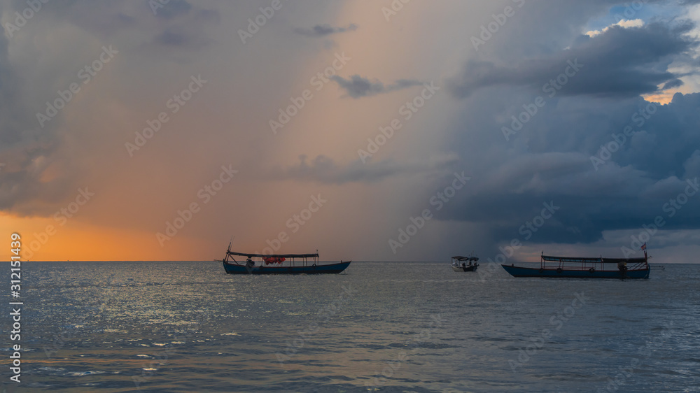 Koh Rong Island, Cambodia at Sunrise. strong vibrant Colors, Boats and Ocean