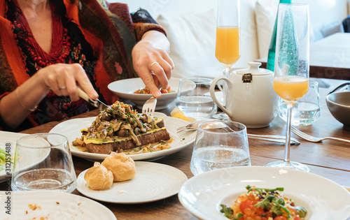 colorful and trendy brunch table on a bright day 