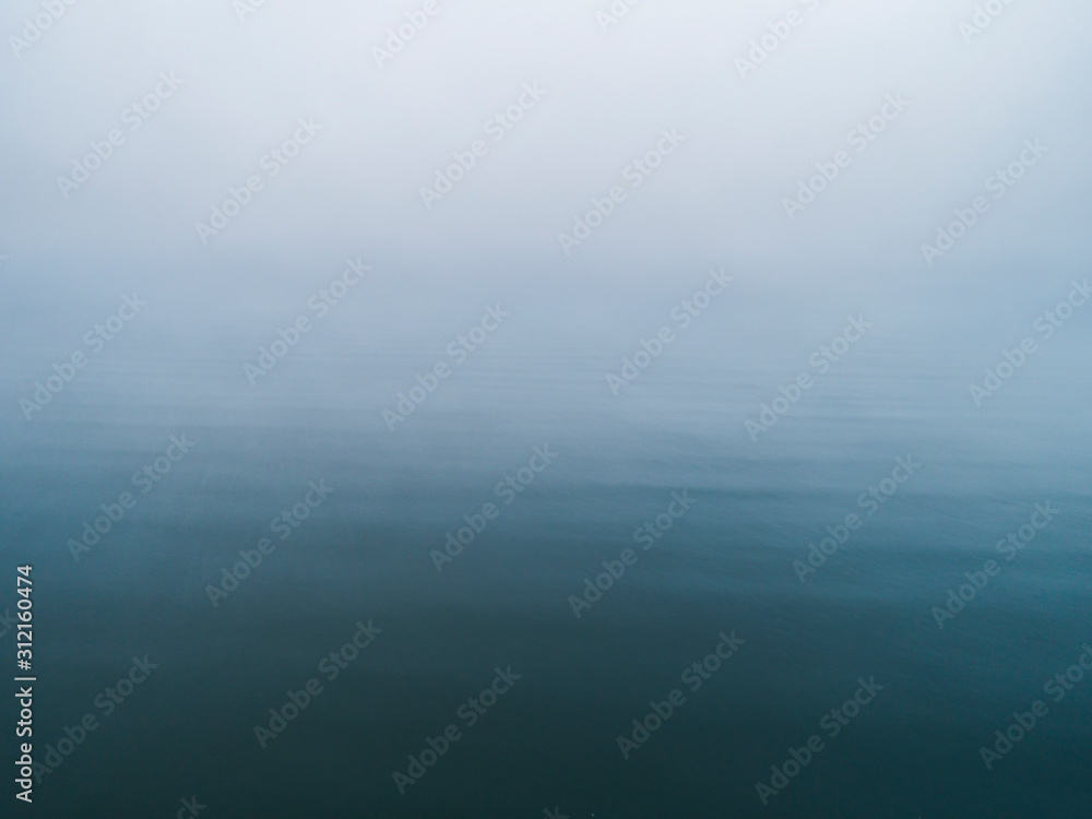 Deep sea with mist approaching