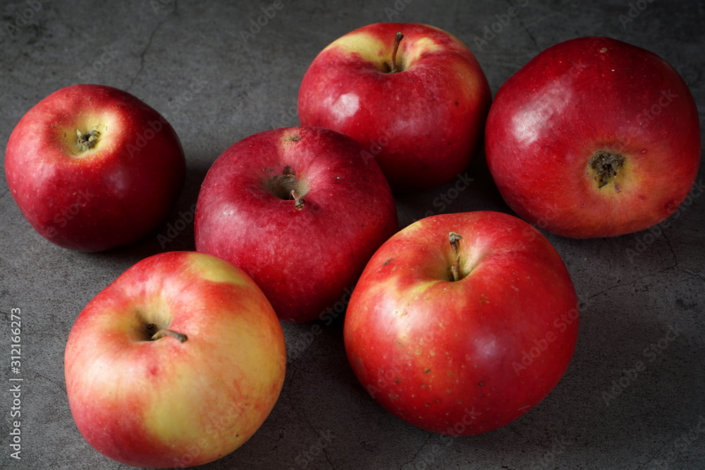 Red apples on a dark background. Selective focus Red apples on a dark background. Selective focus