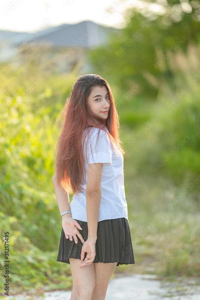 Portrait of asian or thai student university uniform beautiful girl relax and smile Portrait of asian or thai student university uniform beautiful girl relax and smile