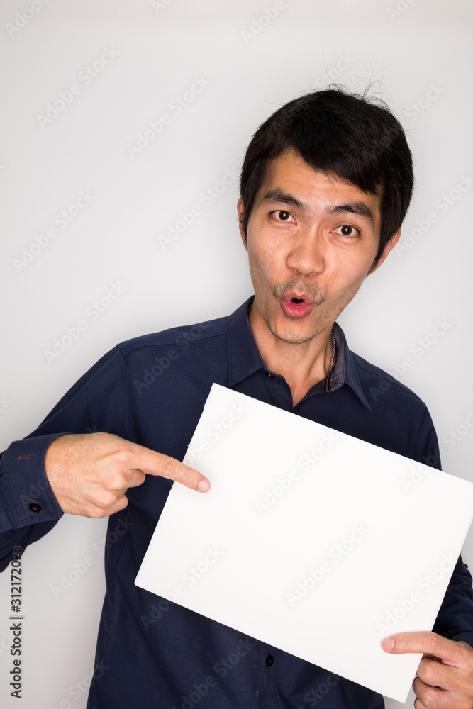 a handsome man in happiness feeling. south east asia business man with happy emotion a handsome man in happiness feeling. south east asia business man with happy emotion