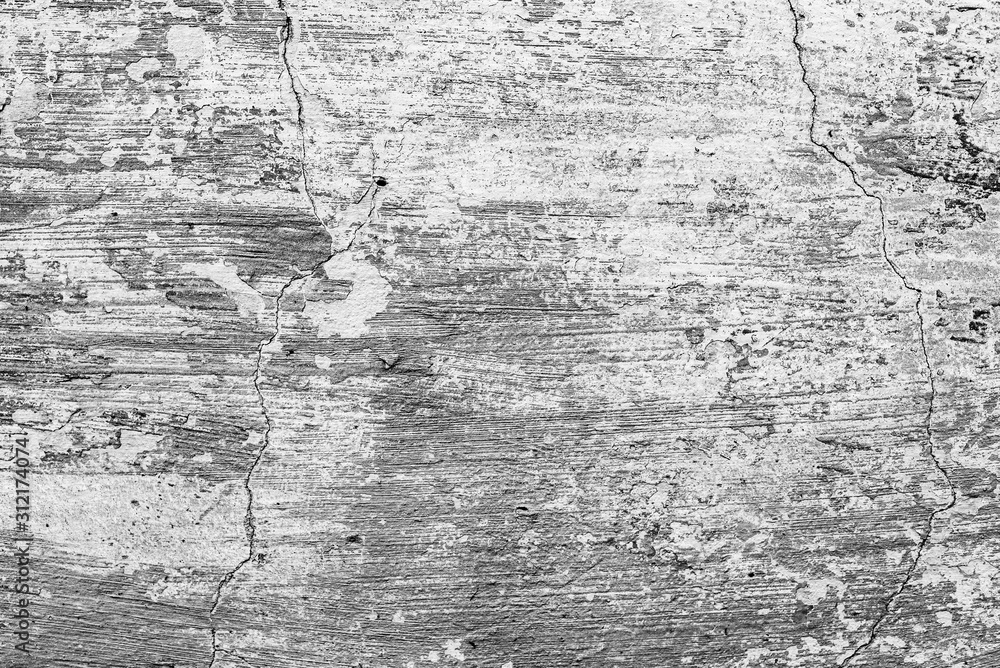 Obraz premium Texture of a concrete wall with cracks and scratches which can be used as a background