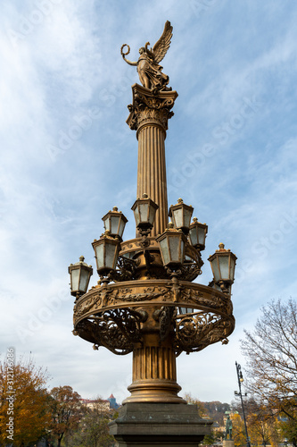 Old historic candelabra in Prague on a sunny day in autumn photo