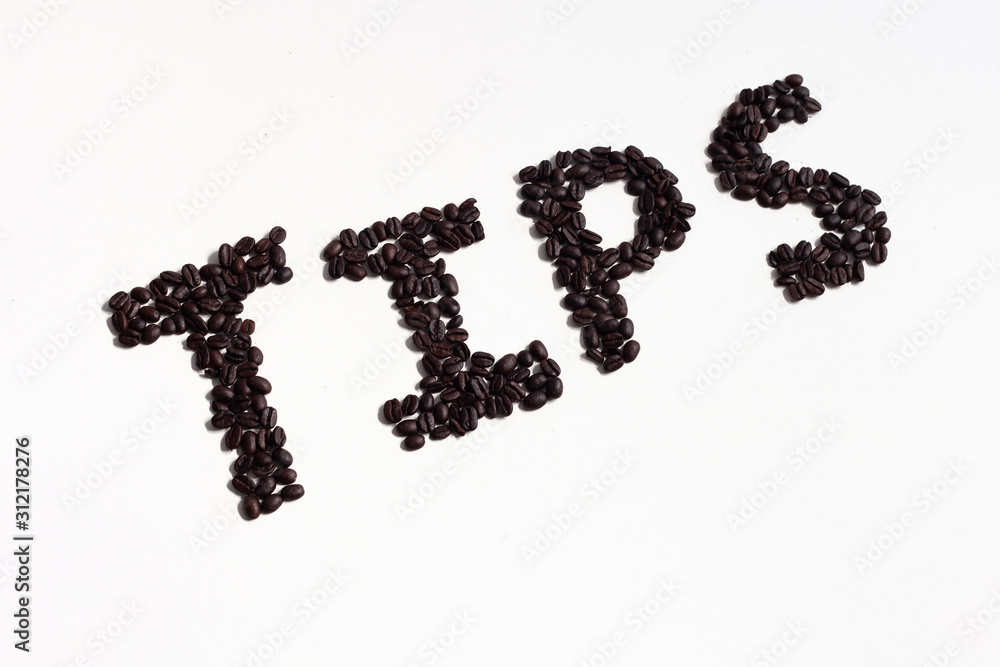 tips sign written in coffee beans