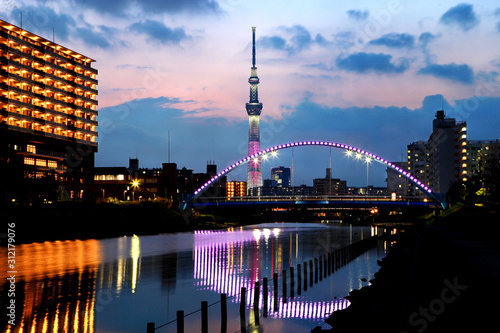 Tokyo city view with Tokyo skytree and bridge on Kyunakagawa river at sunset time